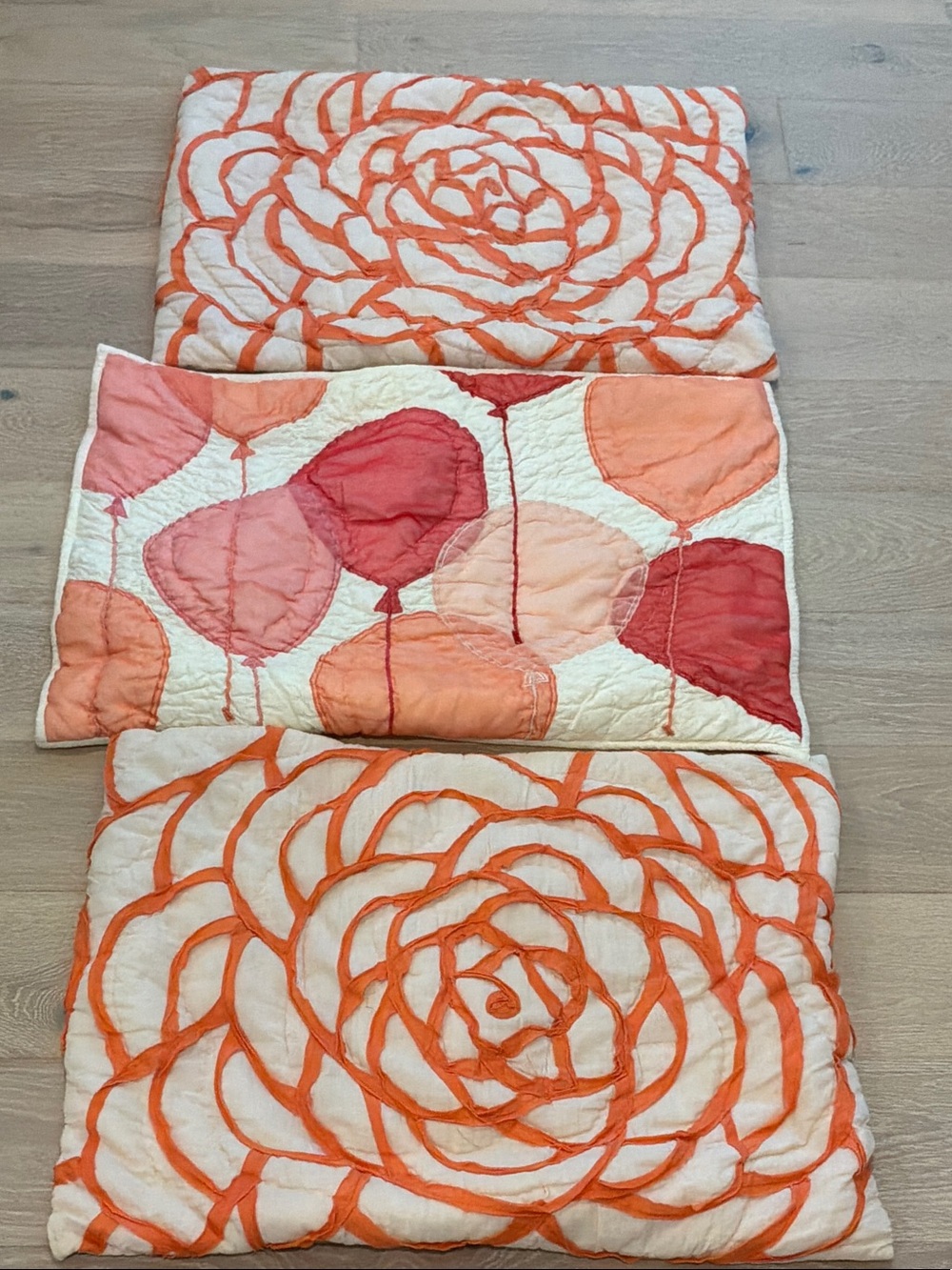 The Land of Nod Cream Quilt with Orange Floral & Pink-Orange Balloons